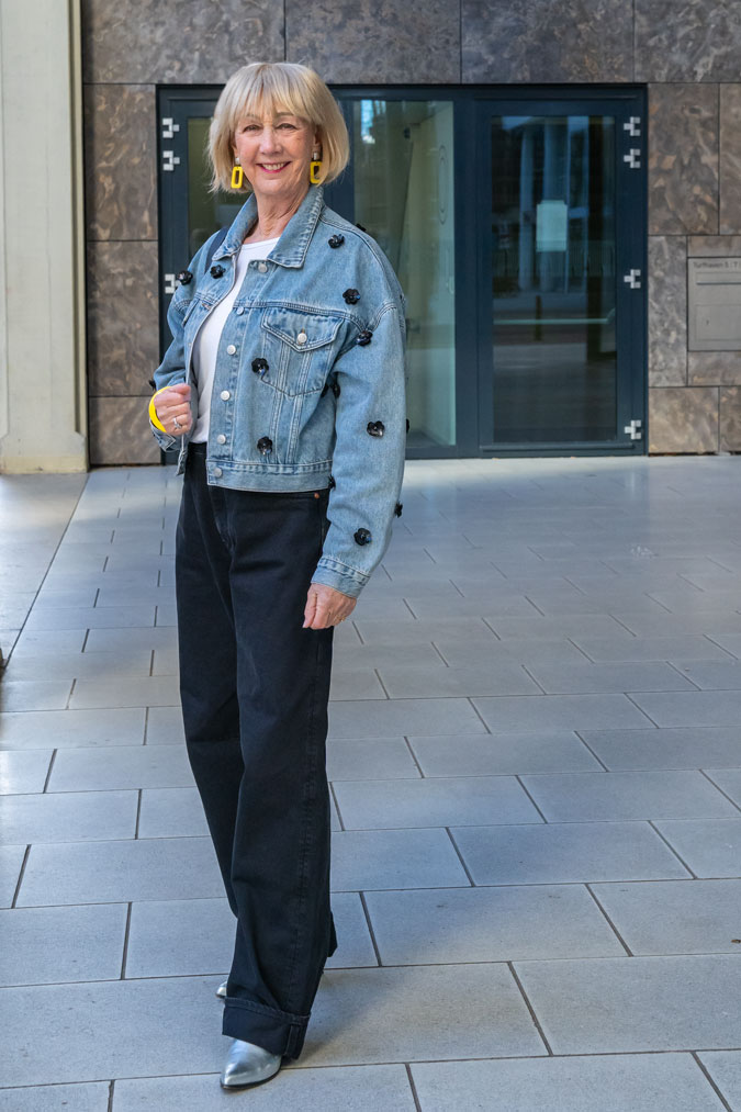 Jeans jacket and black wide leg jeans