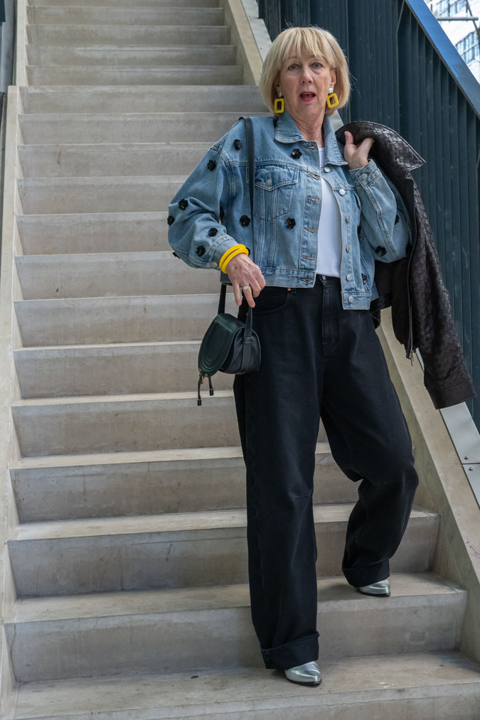 Jeans jacket and black wide leg jeans