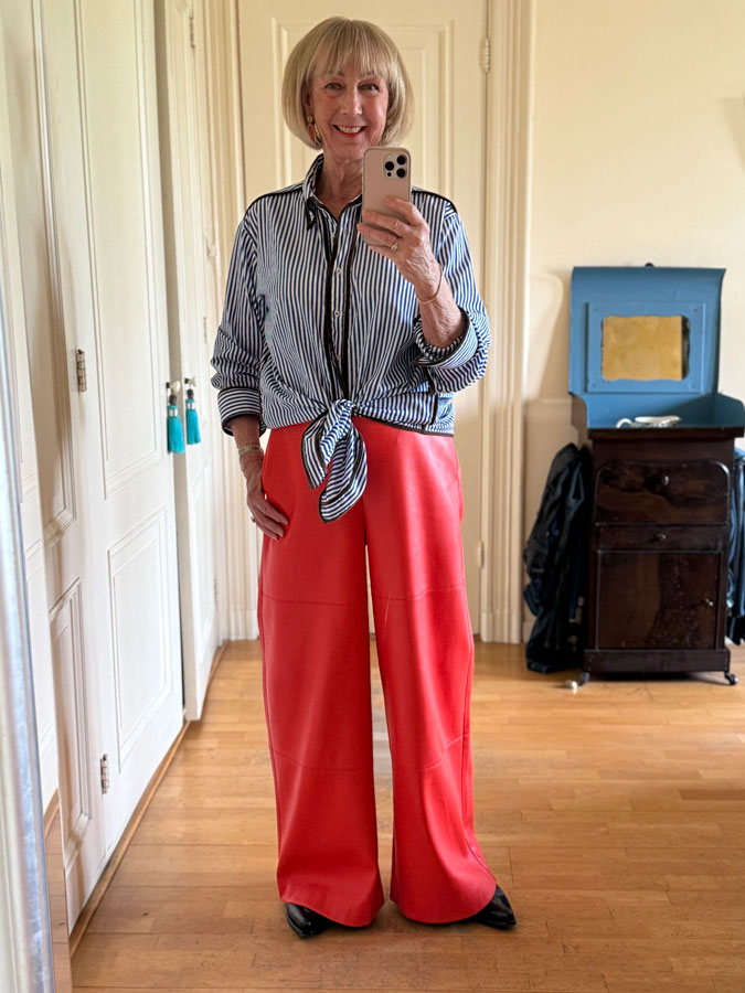 Orange pleather trousers with blue and white striped shirt