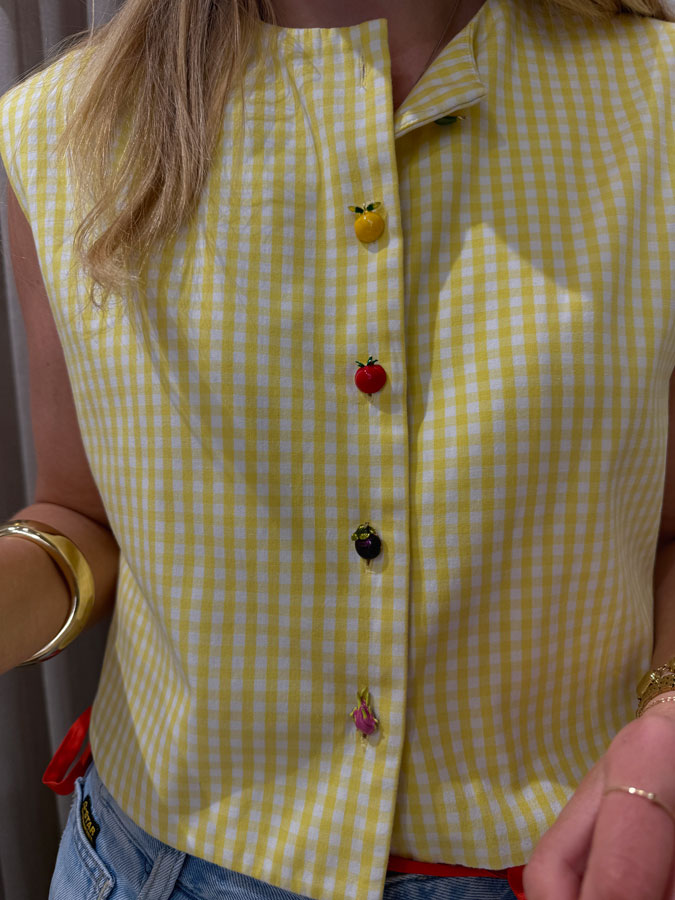 Buttons on the lovely little blouse