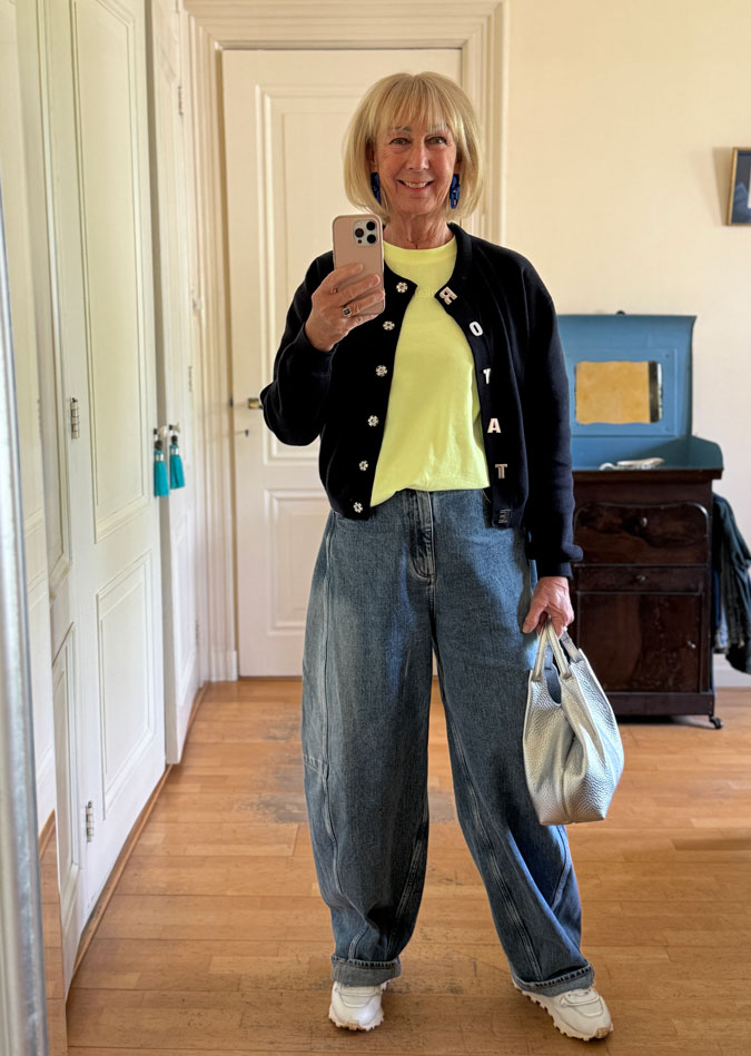 Jeans outfit with neon yellow shirt and navy cardigan