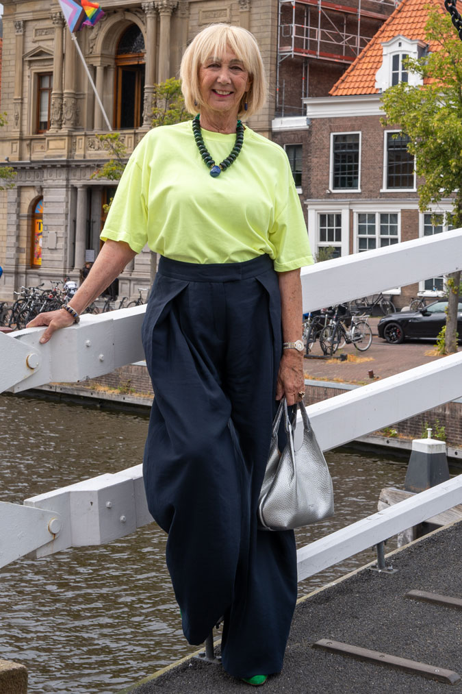 Blue linen trousers with a lime shirt