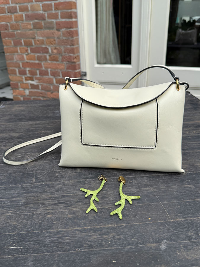Cream Wandler bag and green 'coral' earrings by Lara Design
