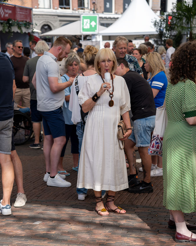 cream dress with brown accessories