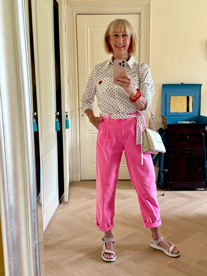Polka dot shirt with pink trousers