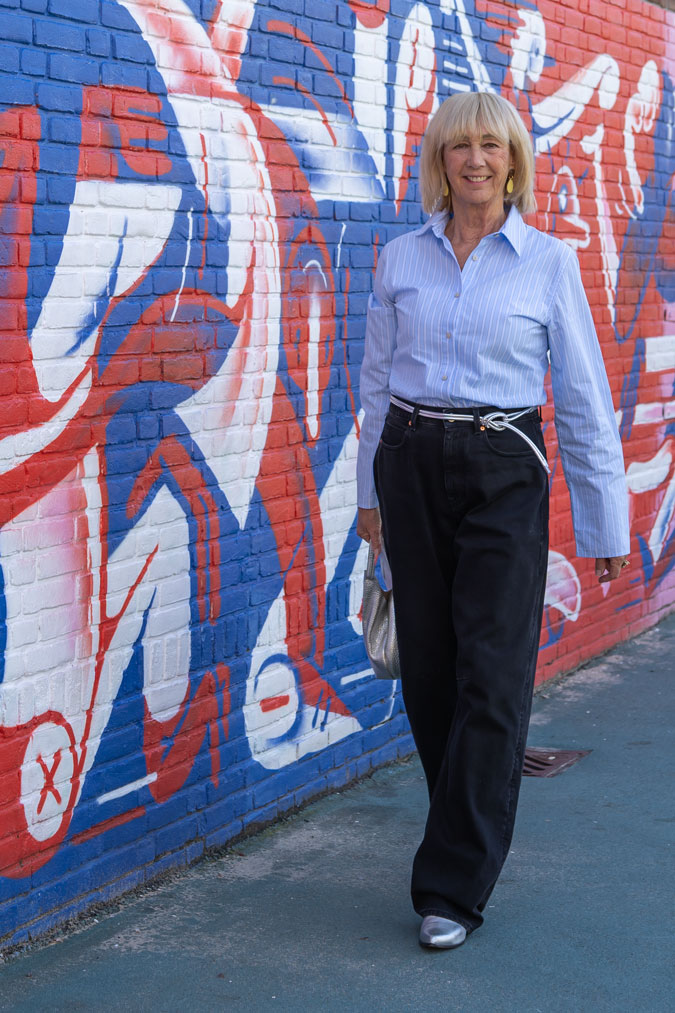 Blue and white striped shirt with black jeans