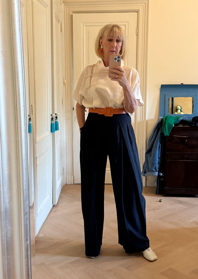 Wide blue trousers with a cream top trial