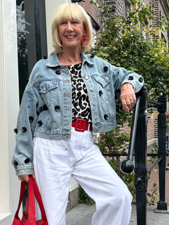 Jeans jacket with black plastic flowers