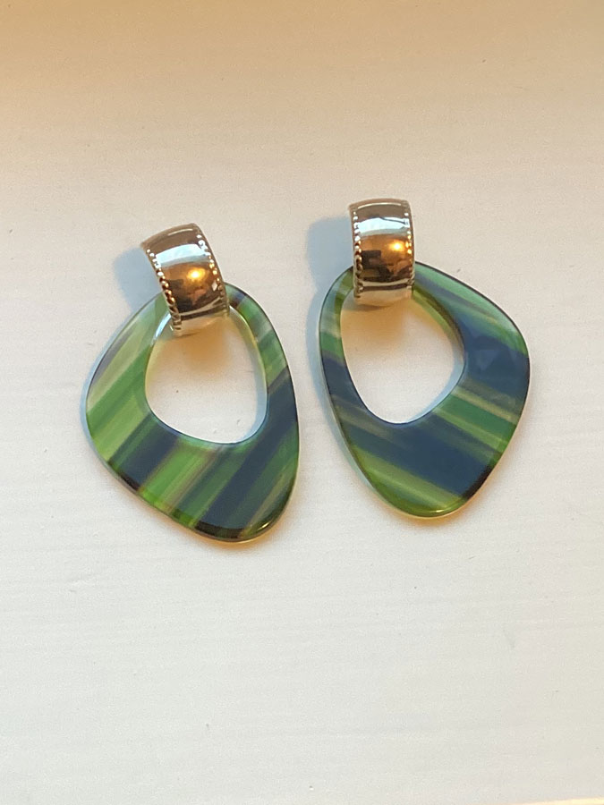 Green earrings by Lara Design.