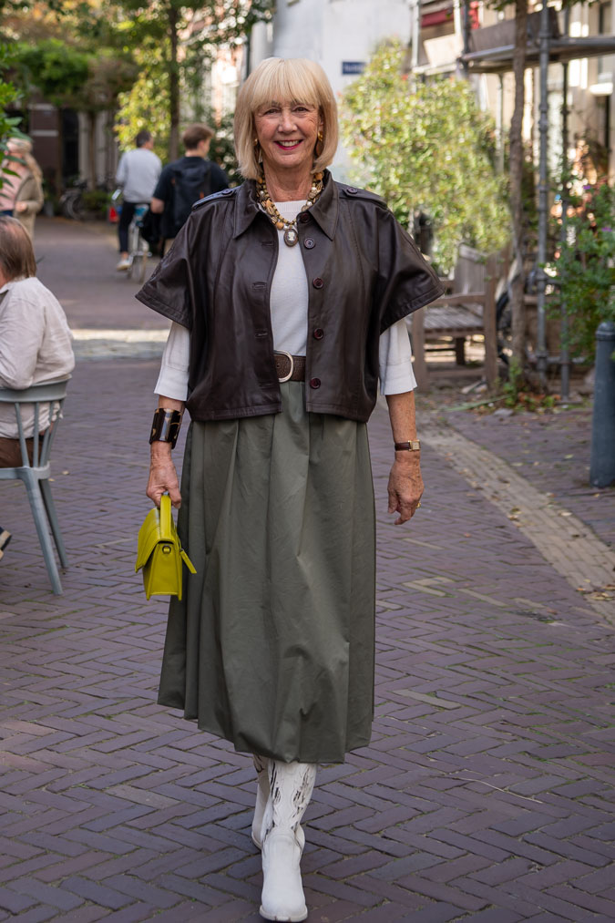Green balloon skirt with brown leather jacket