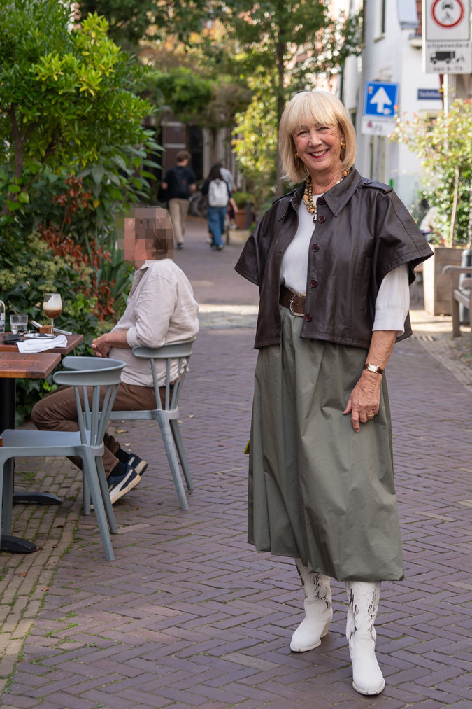 Green balloon skirt with brown leather jacket