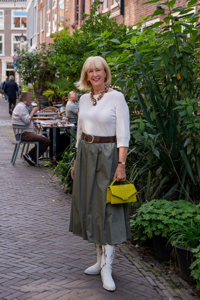 Green balloon skirt with brown leather jacket