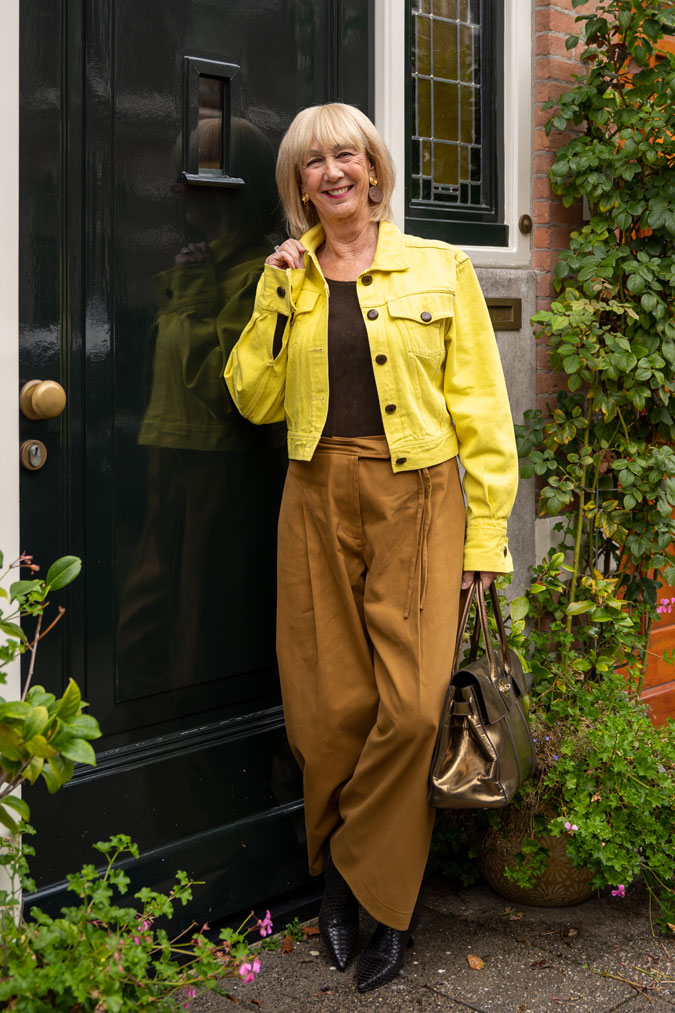 light brown trousers with a yellow denim jacket