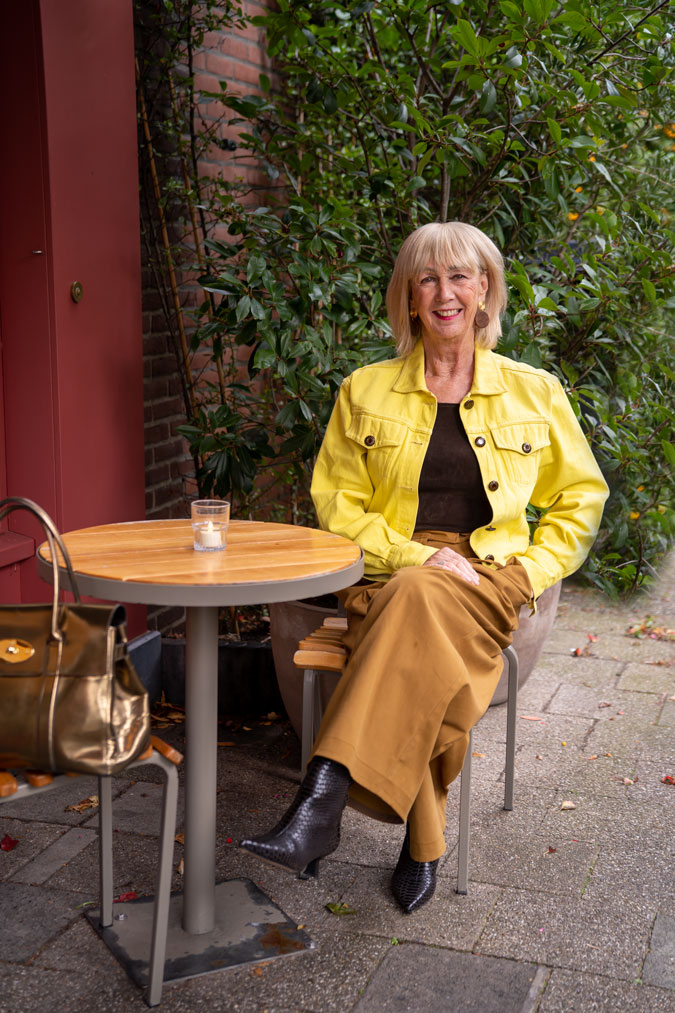 light brown trousers with a yellow denim jacket