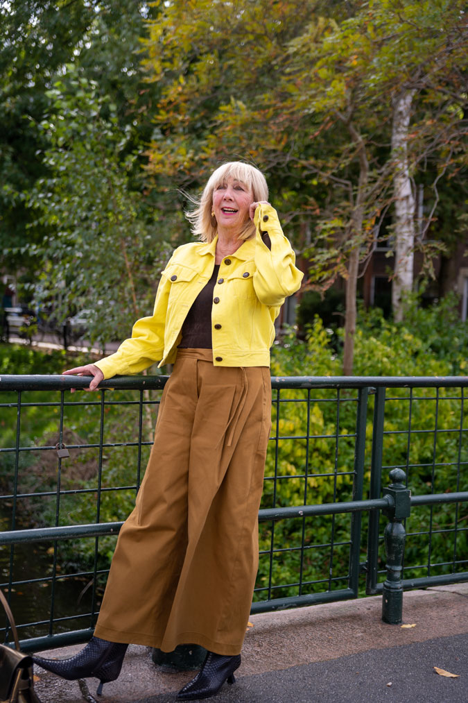light brown trousers with a yellow denim jacket