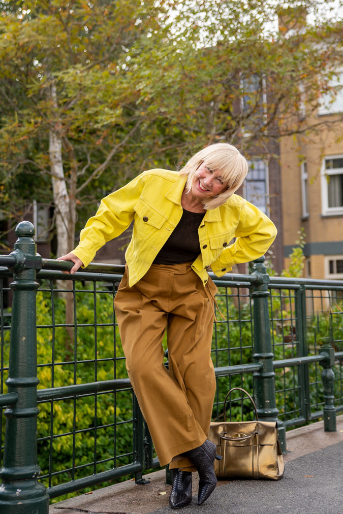light brown trousers with a yellow denim jacket