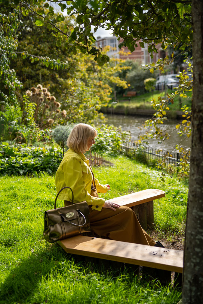 light brown trousers with a yellow denim jacket