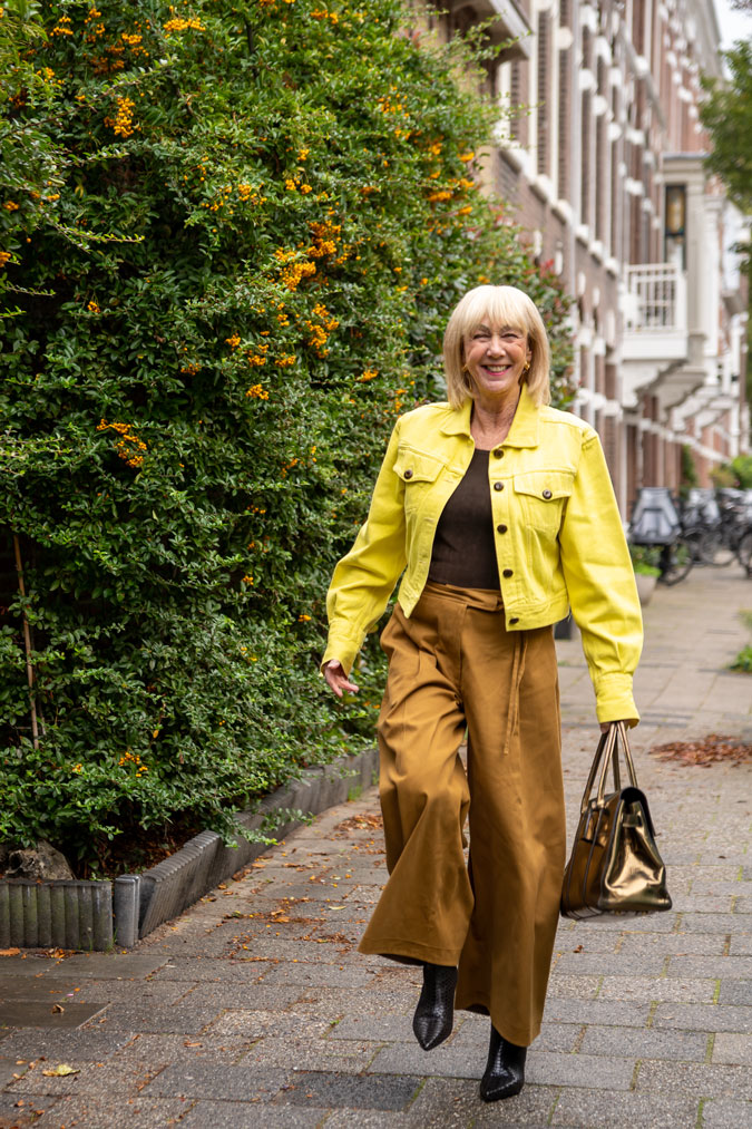 light brown trousers with a yellow denim jacket